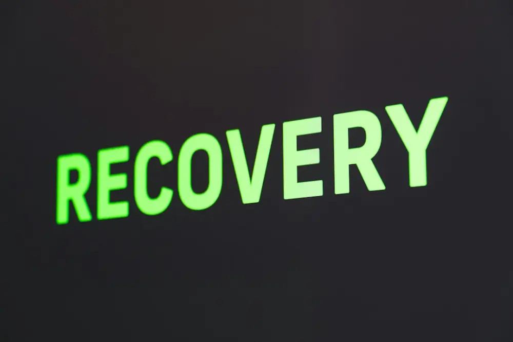 A close up of a sign that reads recovery, illustrating preparing practical technology recovery plans